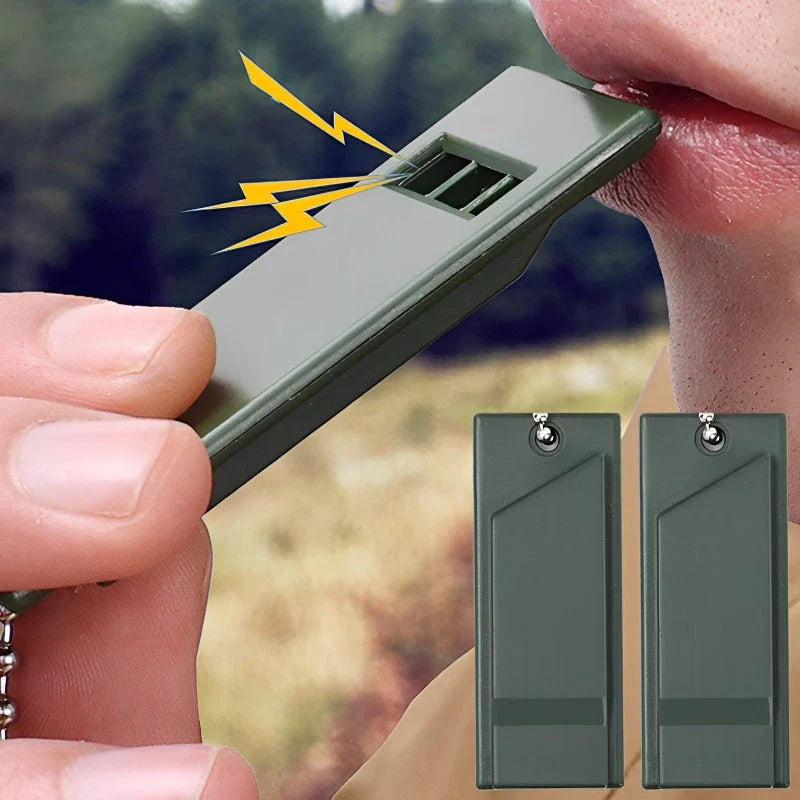 High-decibel outdoor survival whistle in dark green, made of durable polystyrene material for long-lasting use