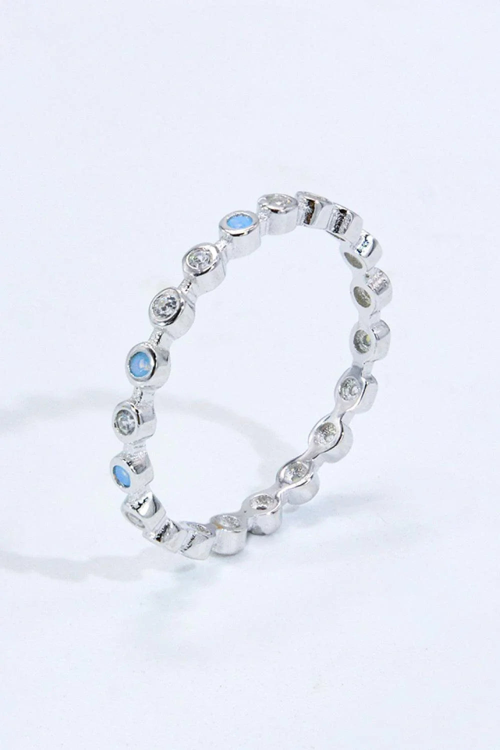 Elegant 925 sterling silver ring with natural moonstone centrepiece and zircon accents