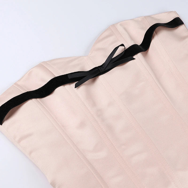 Stylish bow-accented waist back fashion in pink, made with premium polyester for a comfortable and flattering fit.