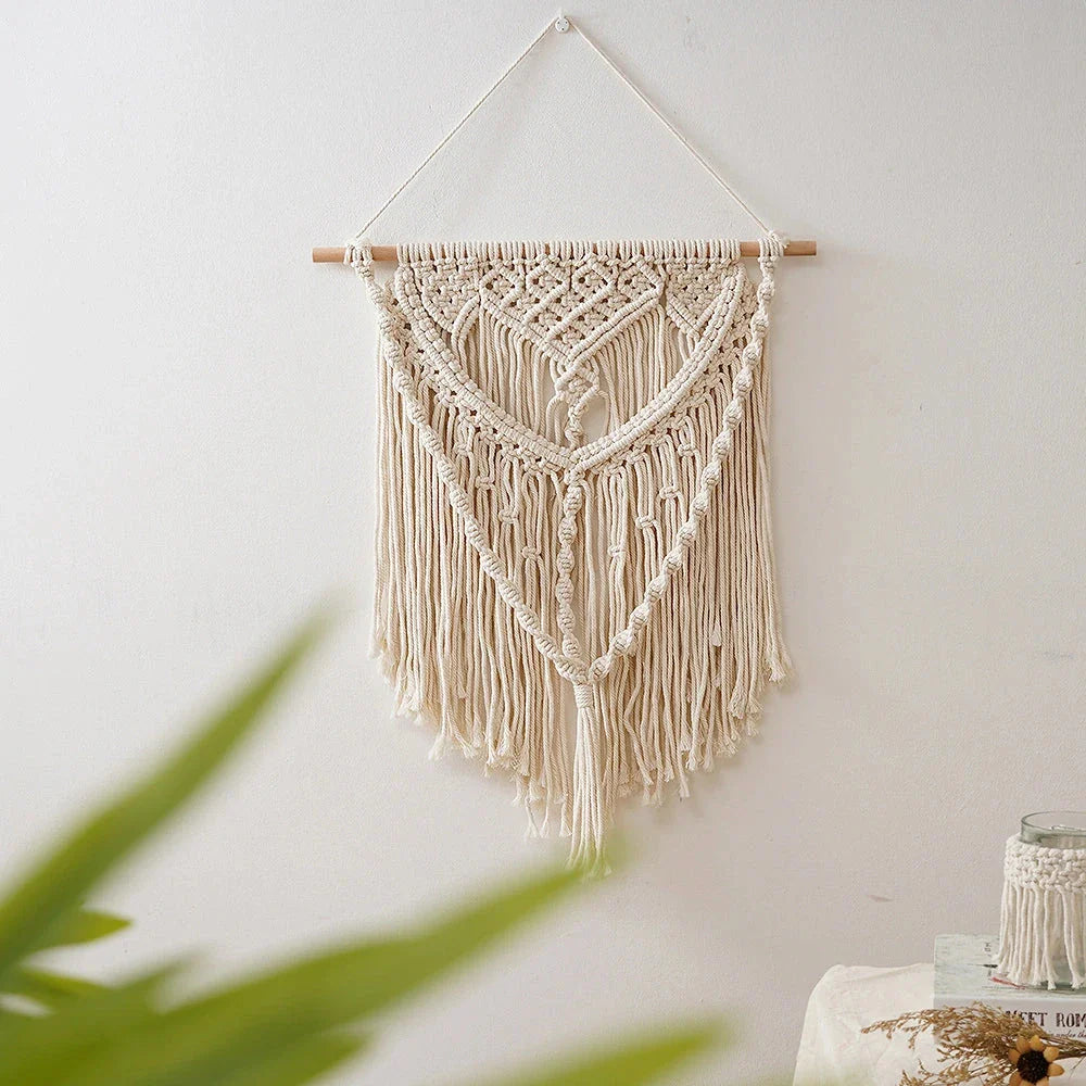 Elegant beige minimalist tapestry with unique oval shape and solid pattern, perfect for modern home decor
