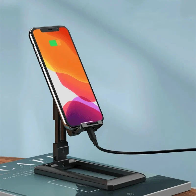 Adjustable and foldable phone stand in pink colour, providing hands-free convenience for work, entertainment, and on-the-go use