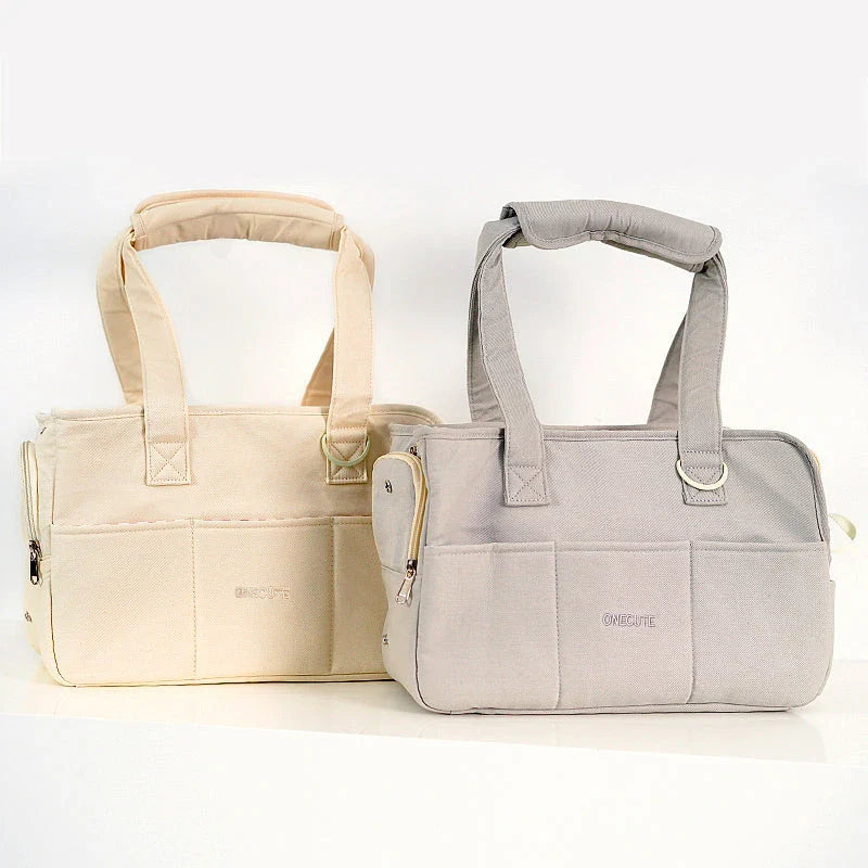 Portable One-Shoulder Pet Carrier Bag made of soft, breathable cotton for comfortable pet travel in the UK