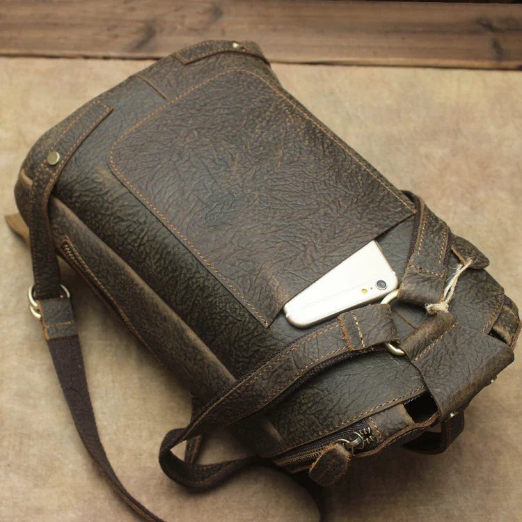 A premium Crazy Horse leather backpack with a classic bucket-style design and retro-inspired flair, perfect for the discerning urban adventurer.