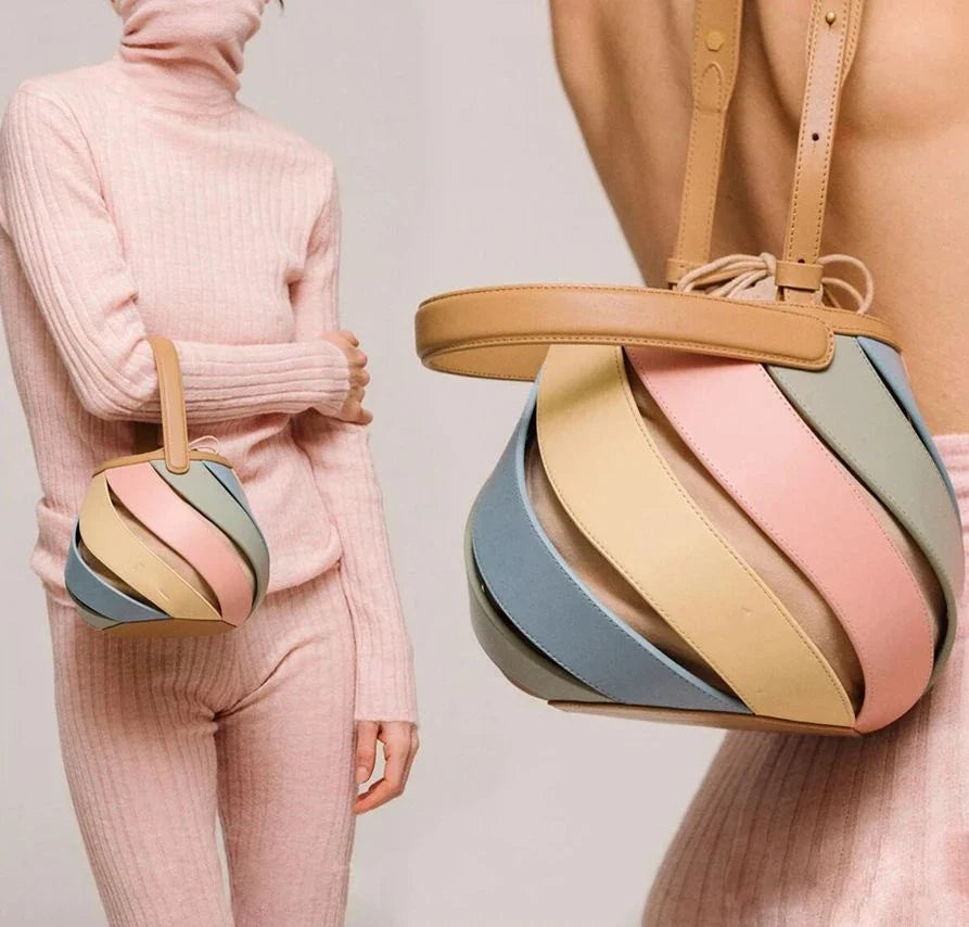 Stylish striped PU leather bucket handbag with versatile carry options and roomy interior