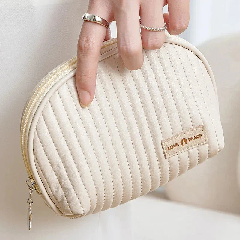 Compact Shell Cosmetic Bag for Women - A stylish and functional makeup pouch for the modern British woman