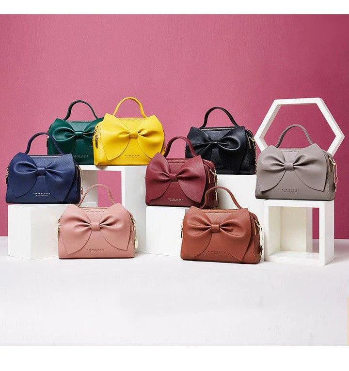 Elegant brown Korean-inspired bow shoulder bag with adjustable strap and roomy interior