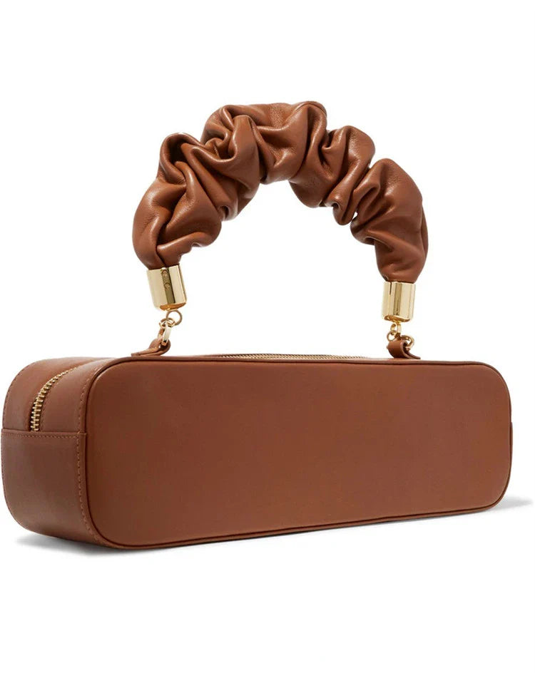 Sophisticated long shoulder diagonal bag with a sleek horizontal square design, made of durable synthetic leather and featuring a single shoulder strap for hands-free convenience.