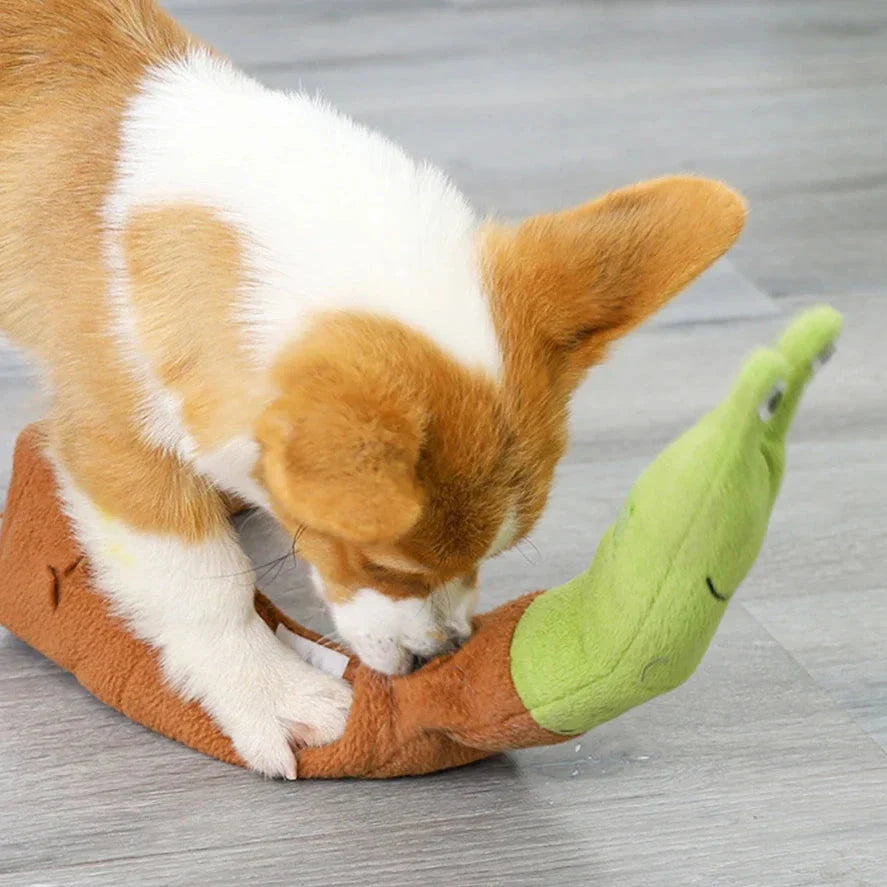 A plush snail-shaped snuffle mat toy with hidden treat pockets, designed to stimulate a dog's natural foraging instincts.
