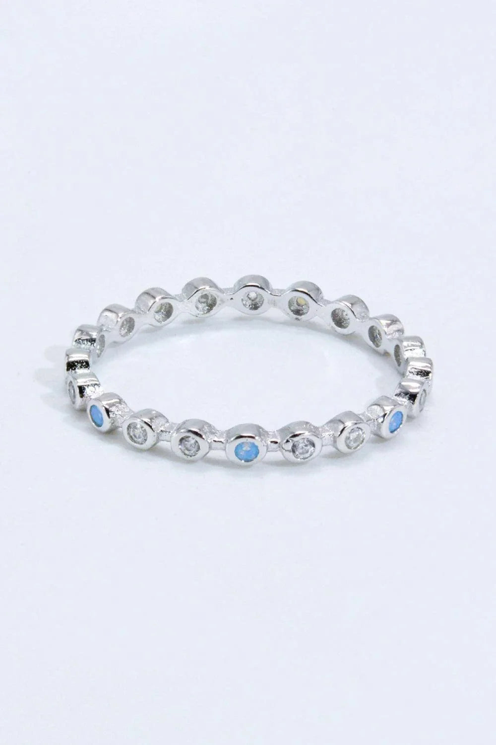 Elegant 925 sterling silver ring with natural moonstone centrepiece and zircon accents