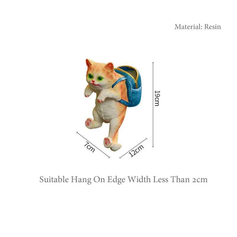 A charming resin cat figurine wearing a stylish backpack, serving as a unique garden decoration and practical storage solution.