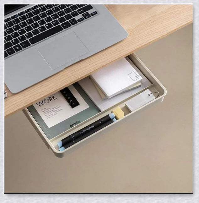 Discreet hidden under-desk storage drawer for pens, pencils, and other office supplies