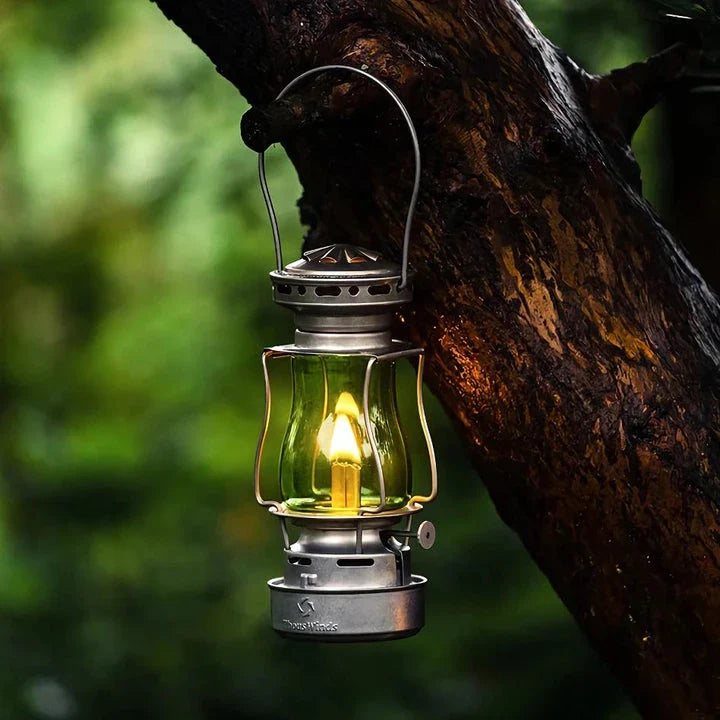 Classic vintage-inspired kerosene camping lamp with stainless steel construction and automatic ignition for reliable outdoor lighting