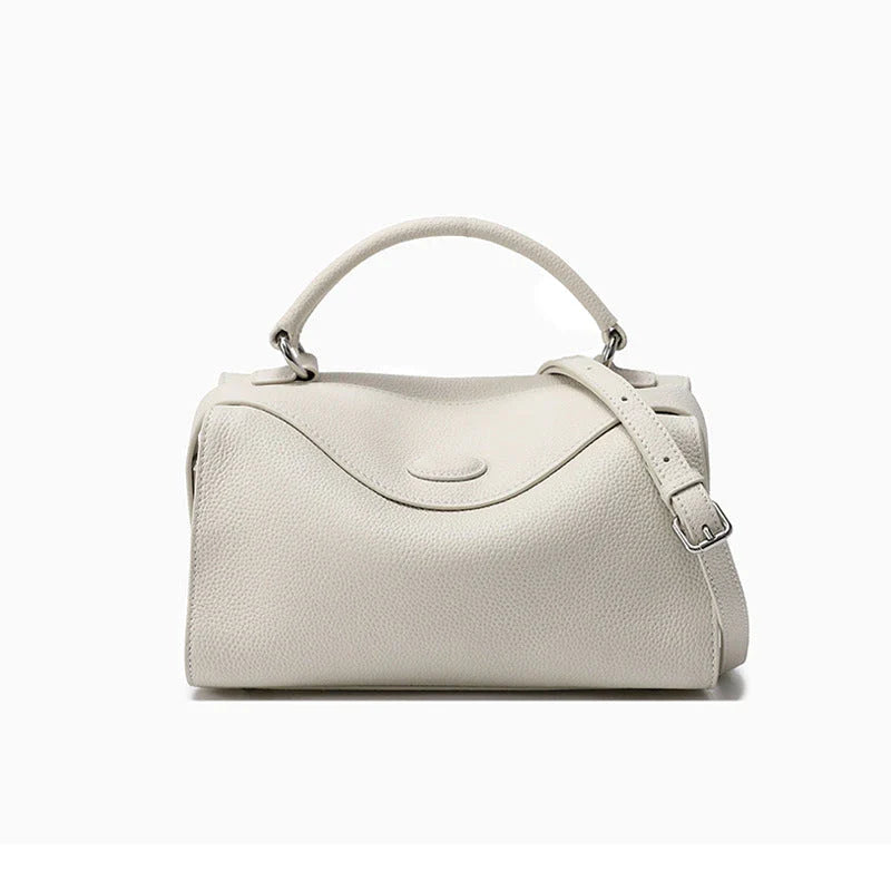 Premium British cowhide leather shoulder bag with multiple interior pockets and adjustable strap for versatile wear