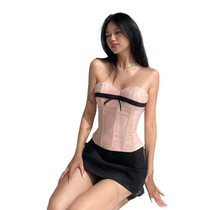 Stylish bow-accented waist back fashion in pink, made with premium polyester for a comfortable and flattering fit.