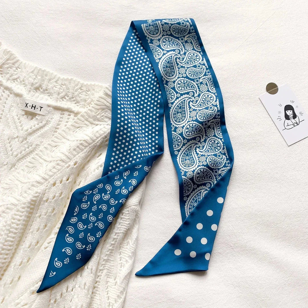 Luxury silk-feel narrow scarf in blue colour, a versatile fashion accessory for the modern British woman