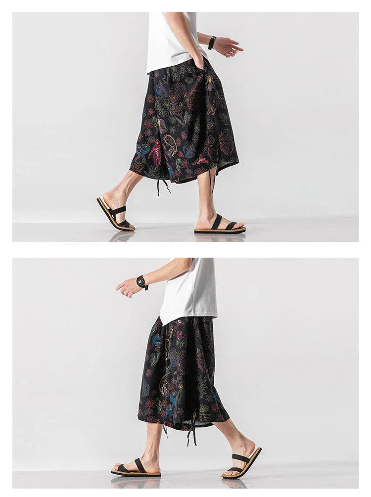 Men's loose-fitting Chinese-inspired cropped pants with a dragon or elephant floral pattern in navy blue, red, or coffee colours