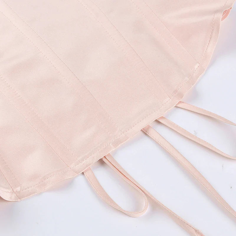 Stylish bow-accented waist back fashion in pink, made with premium polyester for a comfortable and flattering fit.