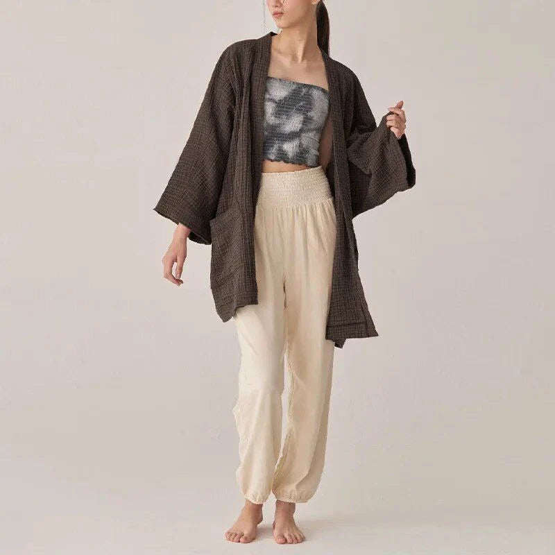 Premium 100% cotton cardigan with elegant open-stitch design, ideal for versatile everyday wear in the UK