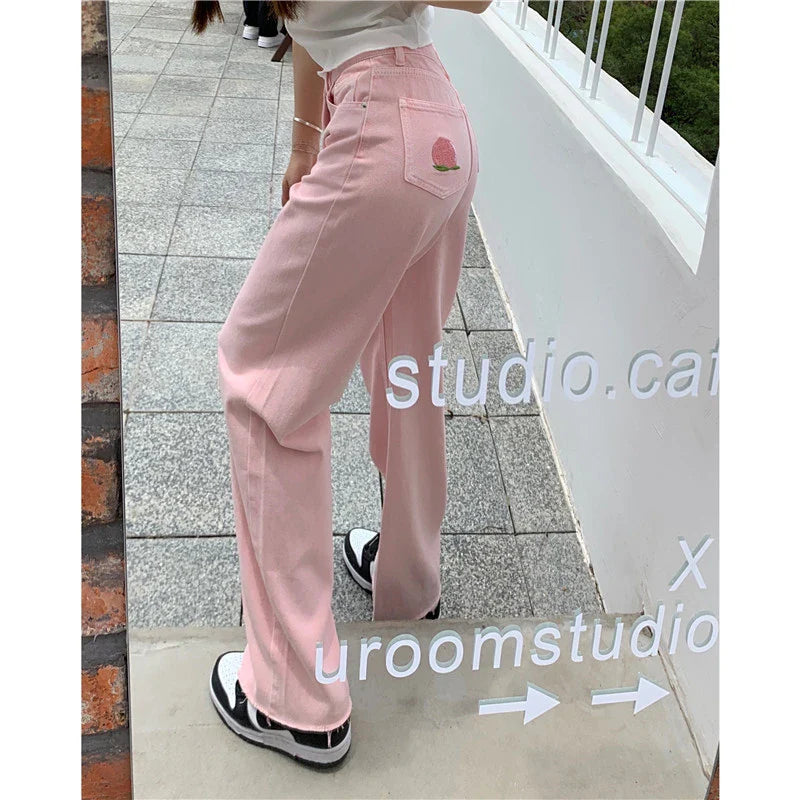 Premium cotton denim high-waist wide-leg trousers in a flattering, figure-hugging silhouette