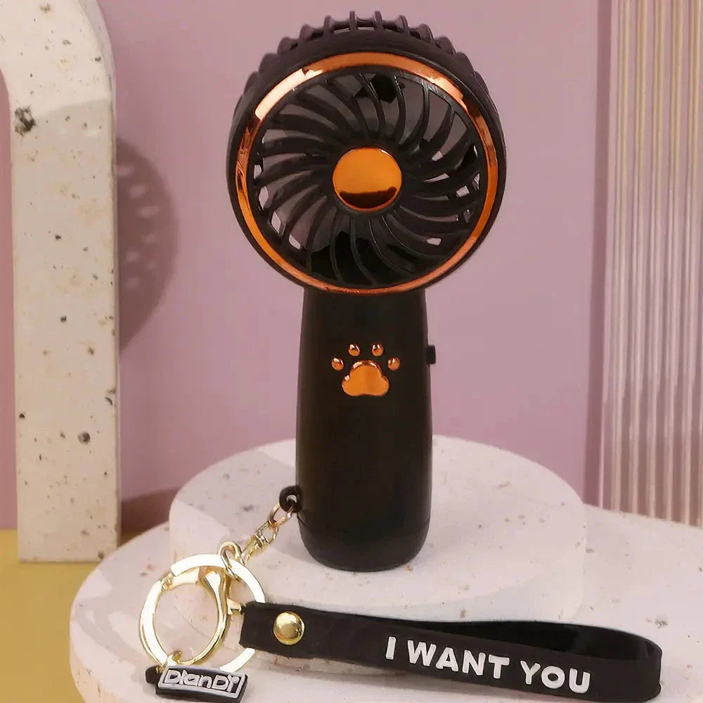 Compact, cartoon-themed USB handheld fan for keeping cool during the summer months