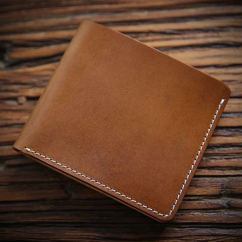 Premium first-layer cowhide money clip in a variety of classic British colours, designed for refined style and secure everyday carry