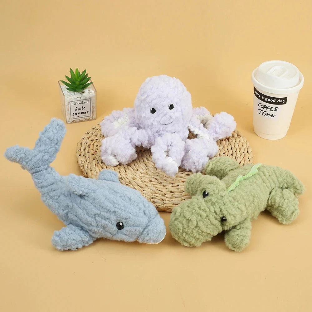 Plush crocodile-shaped squeaky dog toy made of durable, bite-resistant fleece material