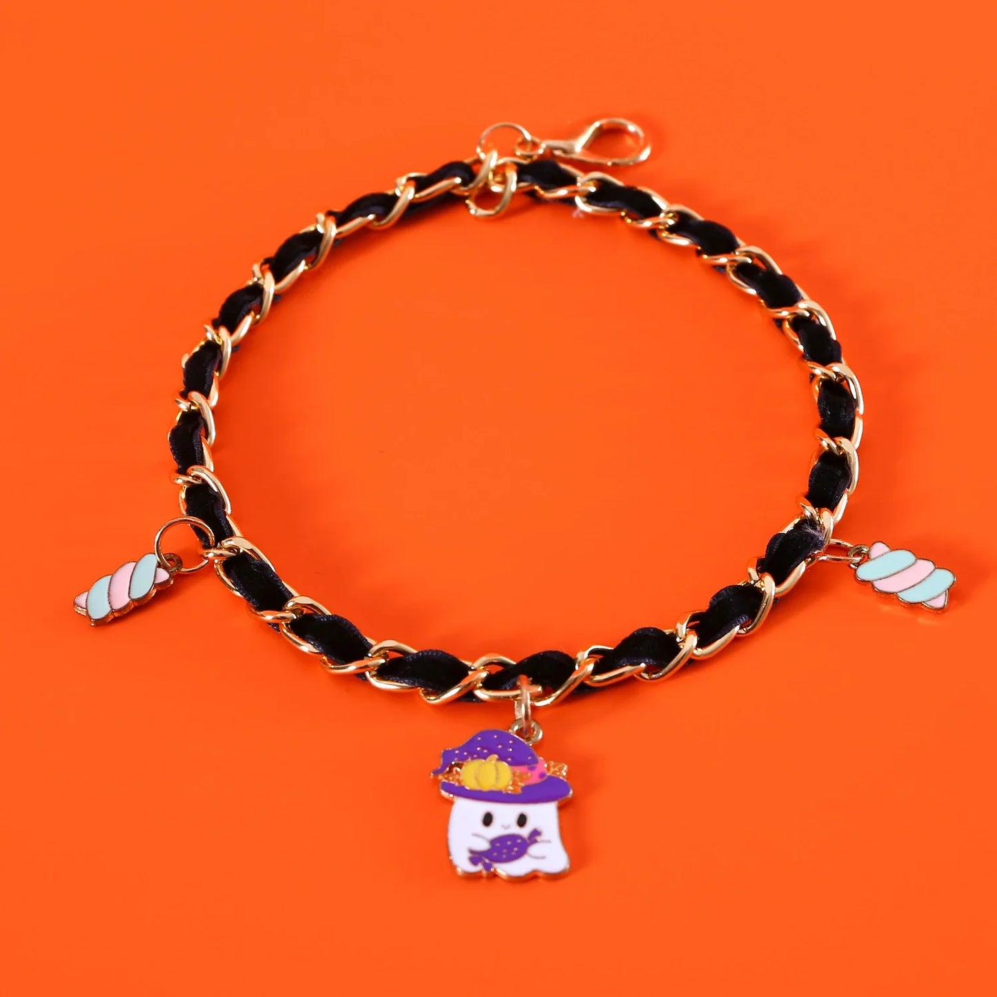 A pet collar made of premium velvet with metal bat charms, perfect for Halloween festivities