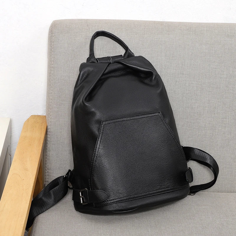 Premium anti-theft leather backpack with cowhide exterior and polyester lining for secure and stylish travel