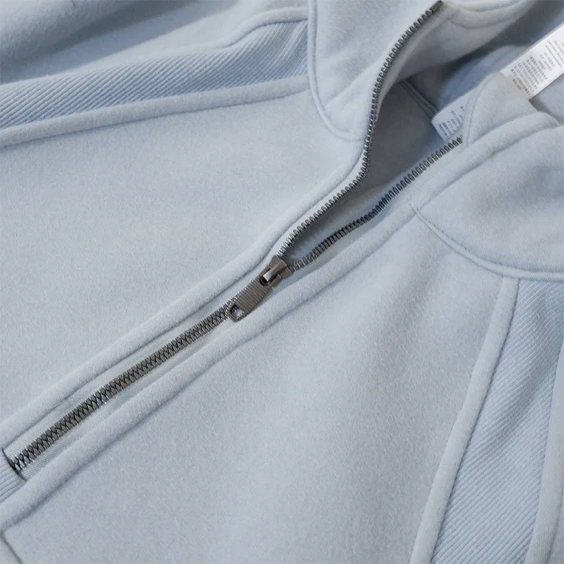 Premium women's sports fleece hoodie with half zip, available in a range of sophisticated colours