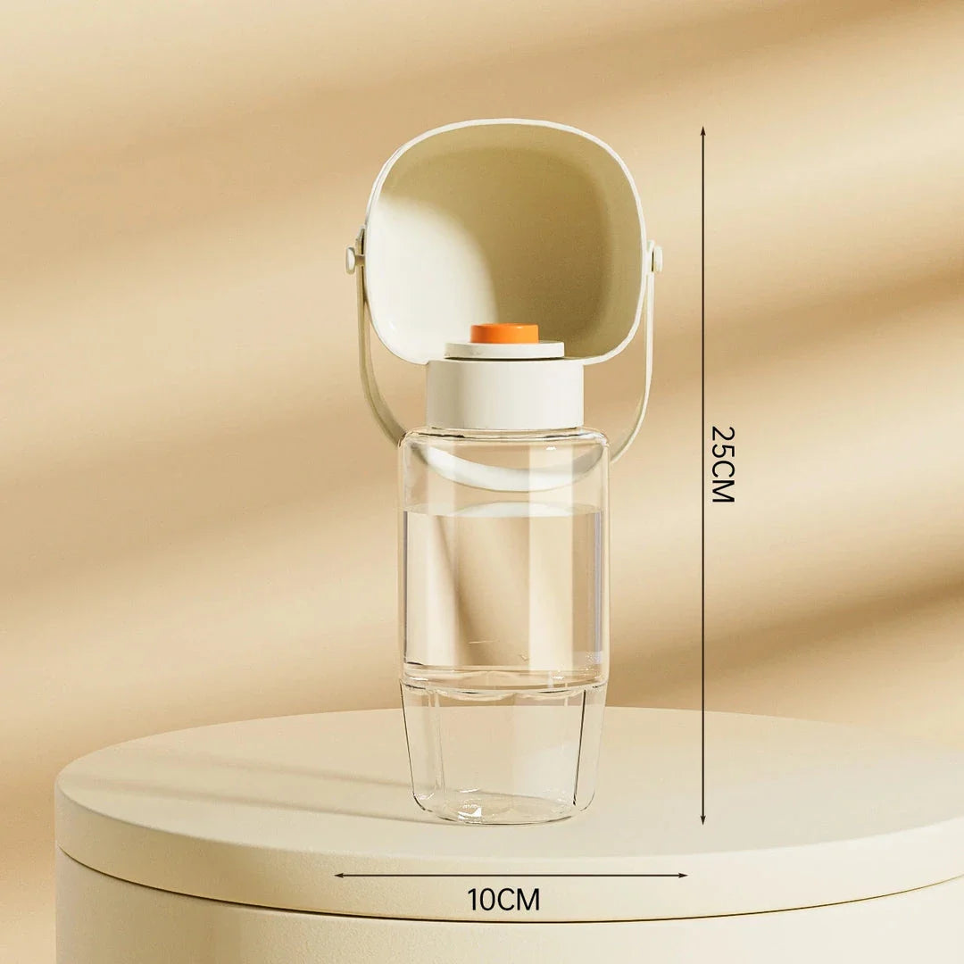 Portable pet water bottle and feeder with separate compartments for water and food, designed for easy hydration and feeding during outdoor adventures.