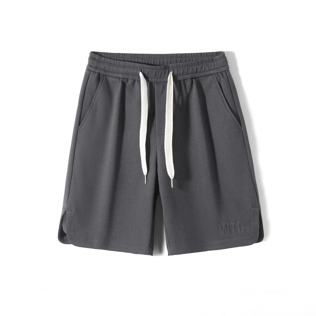 Premium British-made knitted sports shorts in a variety of classic colours, featuring an elastic waistband and loose, comfortable fit.