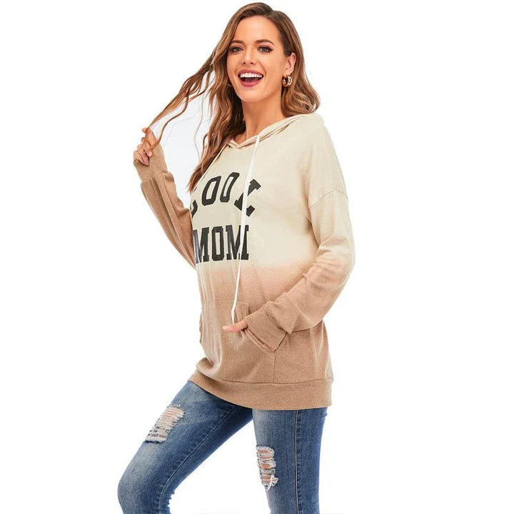 Women's tie-dye hooded sweater with kangaroo pocket in various colours, perfect for casual wear in the UK