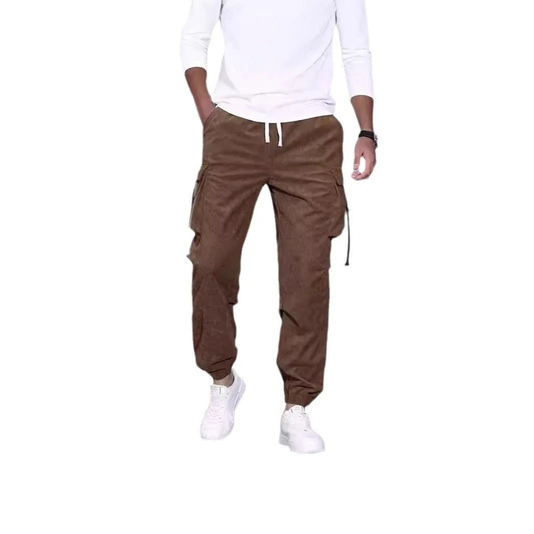 Premium British-inspired corduroy overalls with a relaxed, ankle-tied silhouette and stretchy, breathable fabric for all-day comfort and style.