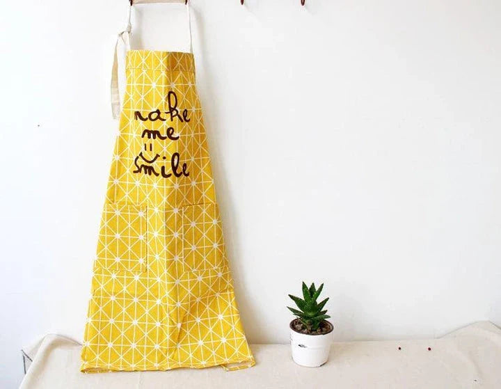 Premium cotton printed kitchen apron with floral design, offering full coverage and adjustable fit for the discerning UK homemaker