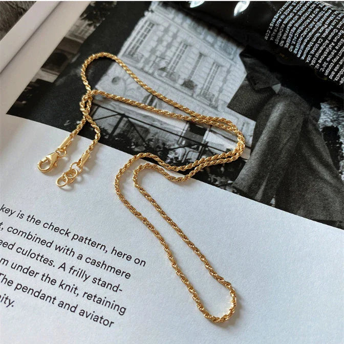 Sterling silver necklace with coastal-inspired fried dough twist design, handcrafted in the UK