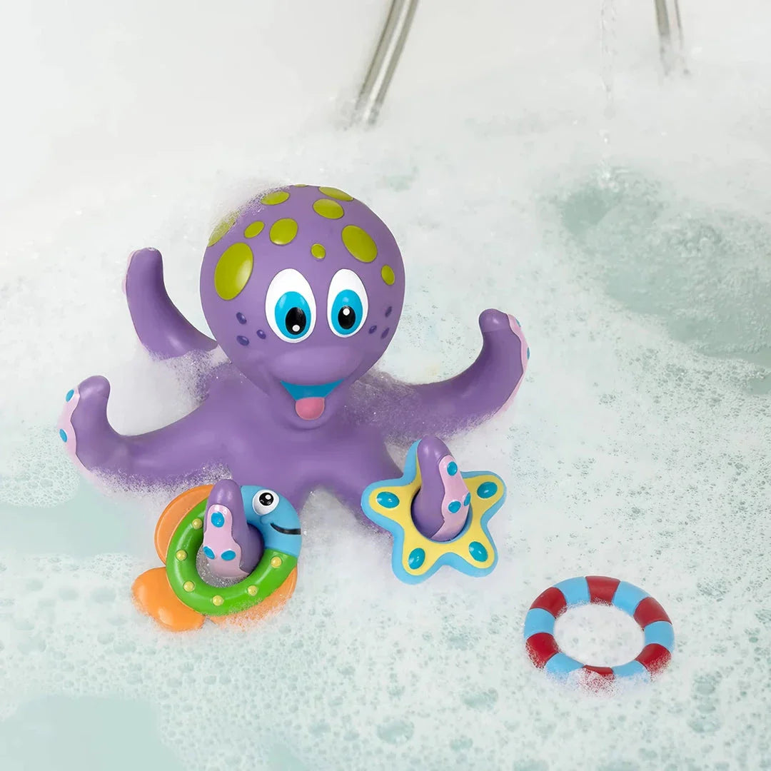 A purple octopus bath toy with colourful rings for tossing and splashing in the water