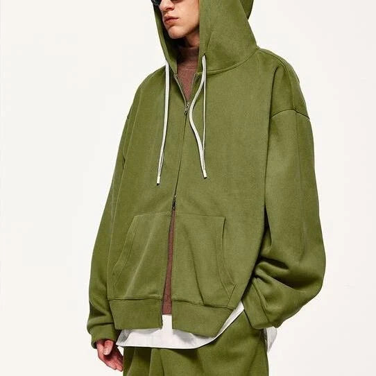 A premium British cotton and polyester hoodie jacket with a zip-up design, featuring a relaxed, oversized fit for everyday comfort and style.
