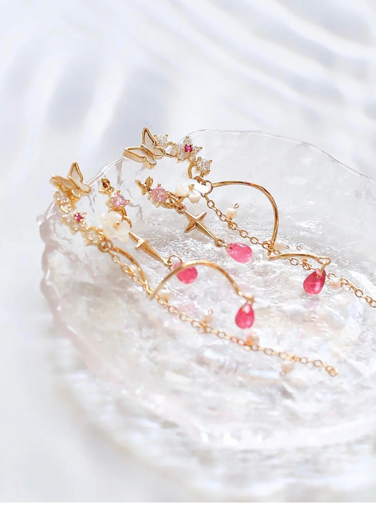 Elegant and Exquisite Gilded Earrings with Zircon Stones, Freshwater Pearls, and Resin Raindrops