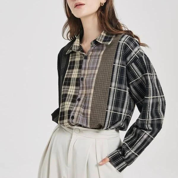 A stylish plaid shirt with a unique patchwork design, made from a comfortable cotton-blend fabric.