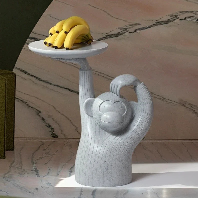 Decorative monkey-inspired resin coffee table tray in light grey or dark grey colour, suitable for serving, display, or as a living room accent piece.