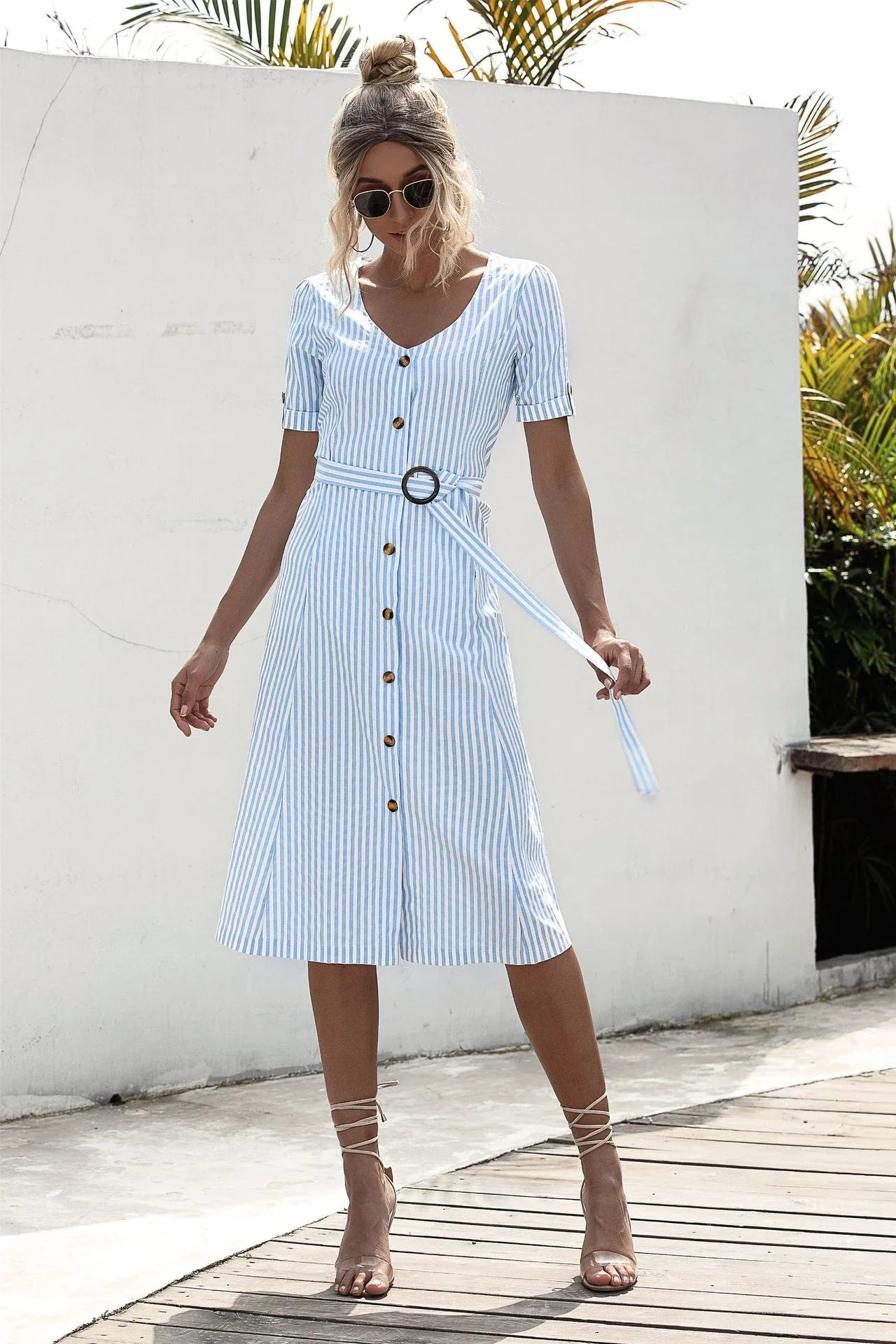 Stylish lace-up button dress in a soft, breathable cotton-blend fabric with a flattering middle waist silhouette