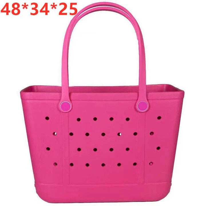 Premium waterproof beach tote bag in various vibrant colours, featuring spacious main compartment and multiple pockets for organised storage