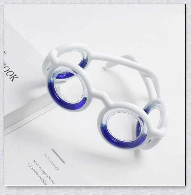 Anti-Motion Sickness Glasses with Boarding Ring technology for relief from nausea, dizziness, and vertigo during travel by car, boat, or plane