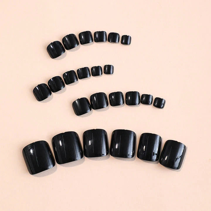 Set of 24 black glossy false toenails for a salon-quality pedicure