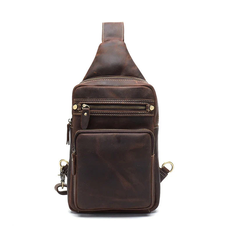 Vintage-inspired genuine leather briefcase with multiple compartments and secure zipper closure, ideal for modern commuters