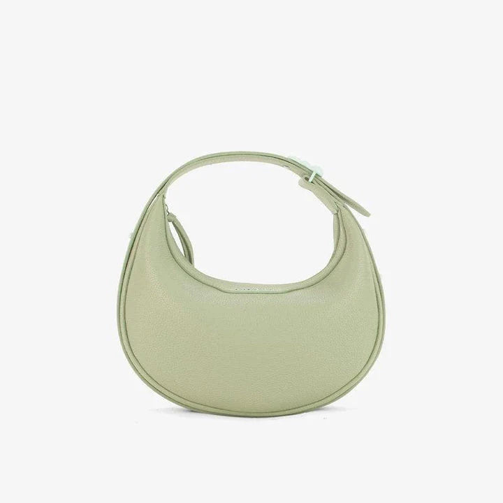 Stylish crescent-shaped leather crossbody bag with soft, supple texture for everyday elegance