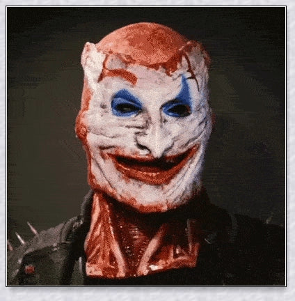Terrifyingly lifelike horror mask with two removable layers, articulated jaw, and breathable design for a comfortable Halloween costume