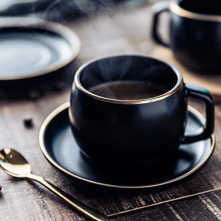 Elegant black ceramic coffee cup and saucer set with sleek, modern design and generous 330ml capacity