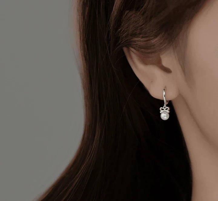 Elegant silver earrings with a Japanese and Korean-inspired butterfly design, made from premium S925 sterling silver