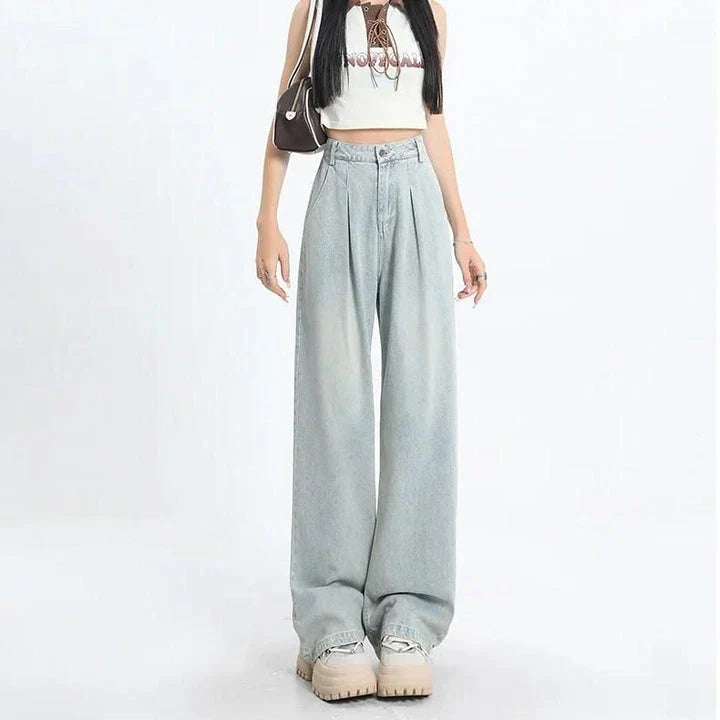 Premium high-waisted vintage straight leg women's jeans in a light wash finish with decorative details